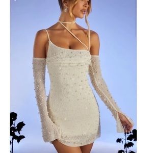 Embellished Asymmetric Corset Mini Dress in Ivory. Size US 4